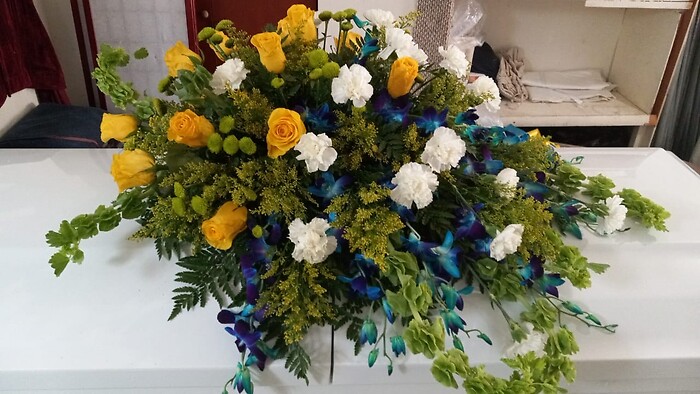 Orchids and Roses Casket Spray